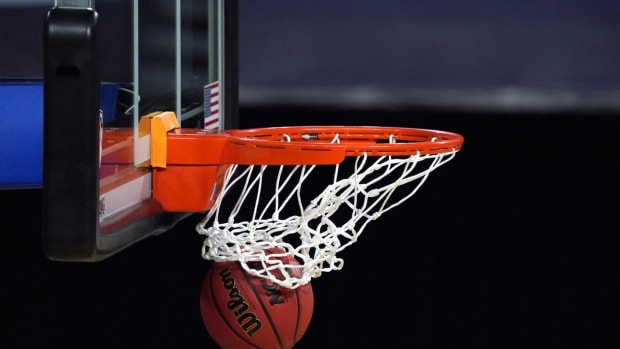 Mar 5, 2021; Las Vegas, NV, USA; A general view of a Wilson NCAA official basketball and rim and net during a Pac-12 Conference women's tournament semifinal between the Arizona Wildcats and the UCLA Bruins at Mandalay Bay Events Center. Mandatory Credit: Kirby Lee-USA TODAY Sports